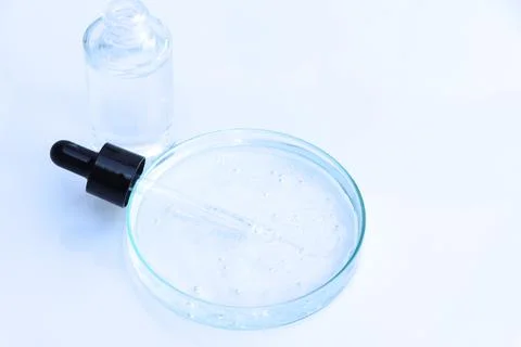 White liquid or raw material for skin care product Stock Photos