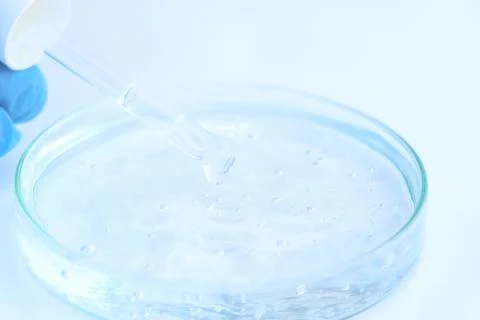 White liquid or raw material for skin care product Stockfoto's