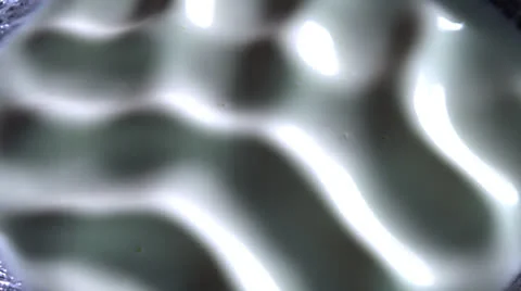 WHITE LIQUID SLOW MOTION Stock Footage 25300545