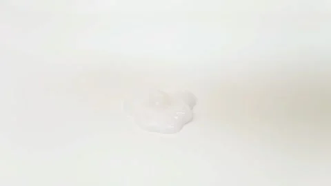 White liquid texture face wash, shampoo, cleanser, cosmetic or skincare product Stock-Footage 294963707
