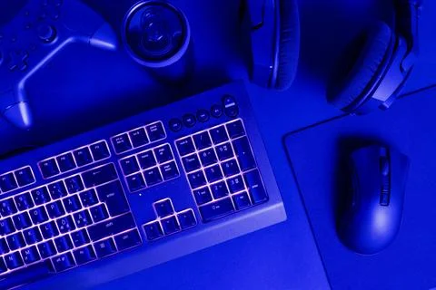 White lit keyboard by various wireless gadgets Stock Photos