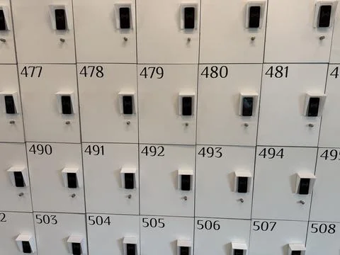 White lockers with numerical codes and rfid sensors 스톡 사진