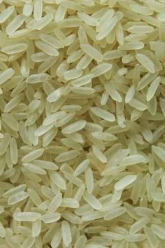White long grain rice macro texture top view Stock Photos