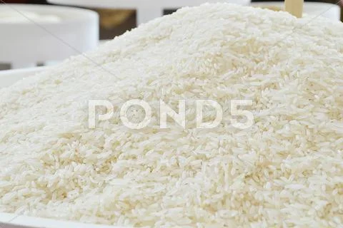 White long rice background, uncooked Stock Photos