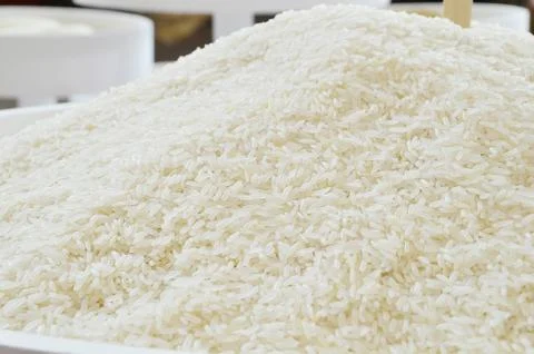White long rice background, uncooked Stock Photos