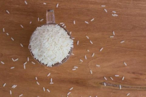 White long rice background, uncooked raw cereals, macro closeup Stock Photos