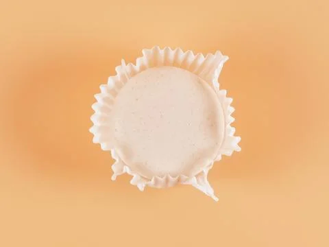 White macaroon on beige Stock Photos