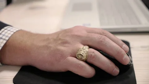 A White male hand holding computer mouse Stock Footage 155535541