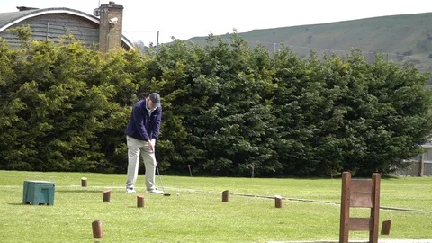 White Man Golf Swing tee off filmed in High Definition Slow Motion Stock Footage 106535744
