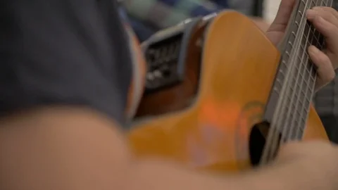 White man hands playing acoustic guitar outdoor Stock Footage 90052039