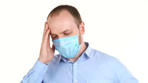 White man in protective mask feeling feeling unwell. Malaise, first symptoms Stock Footage 132771602