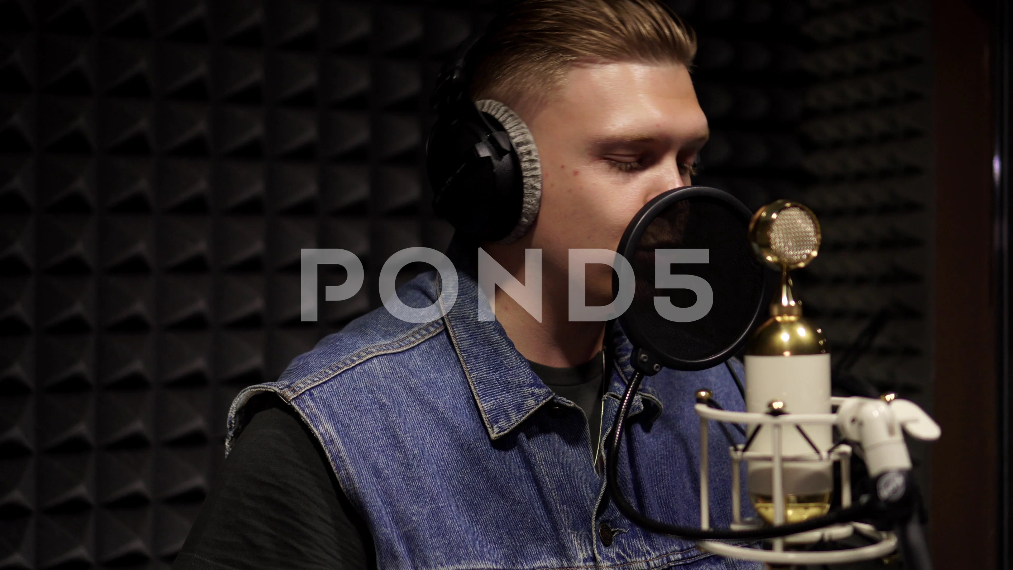 white man reads a rap in a microphone in... | Stock Video | Pond5