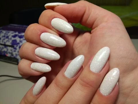 White manicure with sparkles Stock Photos