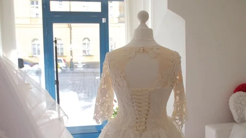 White mannequin on window background Stock Footage 115064764