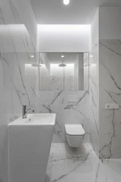 White marble bathroom in modern style Stock Photos