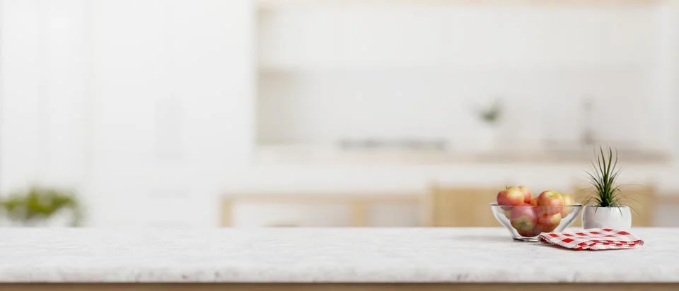 A white marble kitchen countertop with empty space for product display in a.. Stock Illustration