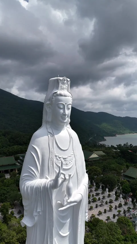 White Marble Lady Buddha Statue Overlooking Da Nang, Vietnam Stock Footage 335834703