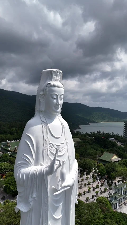 White Marble Lady Buddha Statue Overlooking Da Nang, Vietnam Stock Footage 335834724