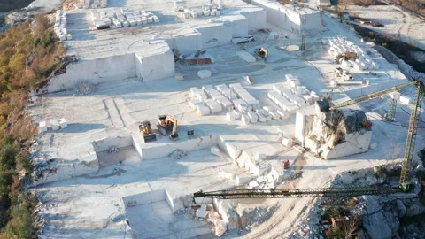 White marble quarry - construction rocks mining in an open-pit mine Stock Footage 144167478