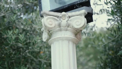 White marble stone column with external lamp on the top for outdoor illumination Stock Footage 260702932
