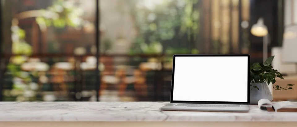 The white marble table featuring a computer mockup with a blurred backgroun.. Stock Illustration