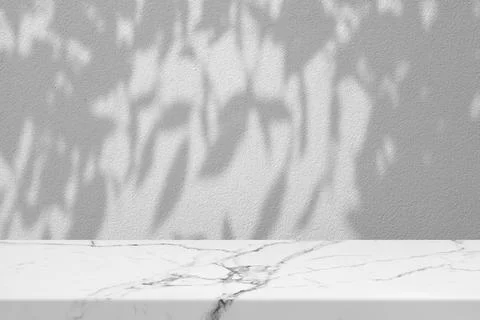 White Marble Table with Tree Shadow on Concrete Wall Texture Background Stock Photos