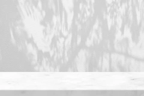 White Marble Table with Tree Shadow on White Wall Stock Photos