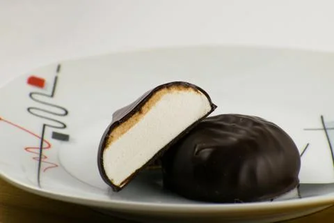 White marshmallows on white background. Stock Photos