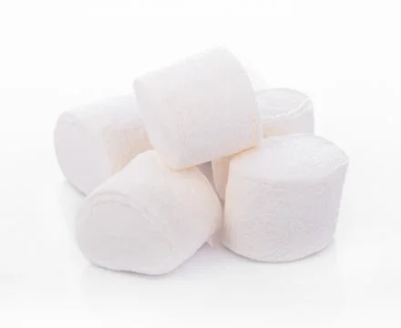 White marshmallows on white background Stock-Fotos