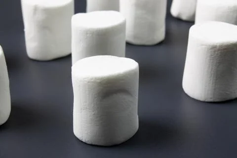 White marshmellow close up on dark background Stock Photos