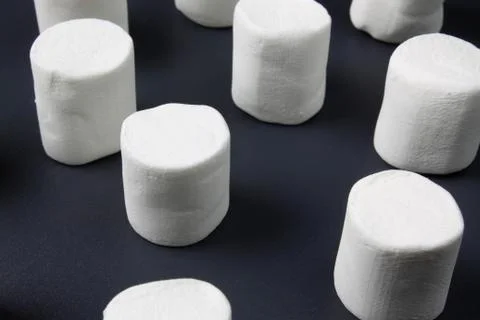White marshmellow close up on dark background Stock Photos