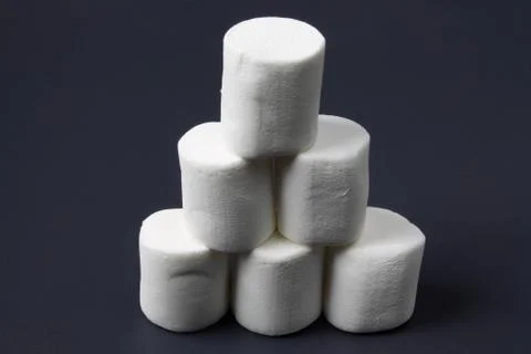 White marshmellow close up on dark background Stock Photos