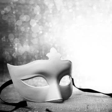 White mask with glittering background Stock Photos
