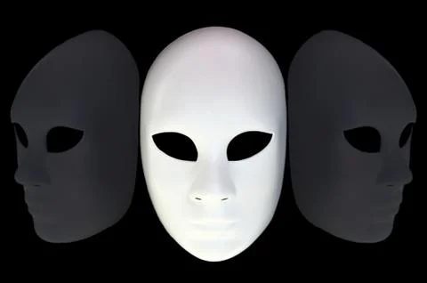 White mask with reflection on black background Stock Photos