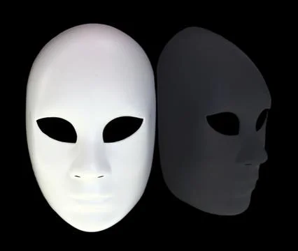 White mask with reflection on black background Stock Photos