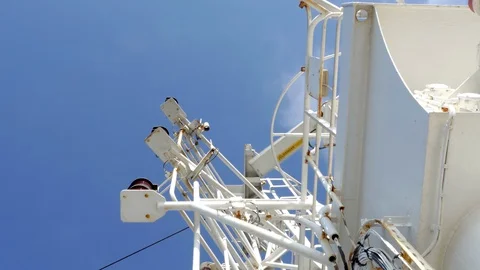 White mast of a modern cargo ship with a rotating antenna Stock Footage 120417165