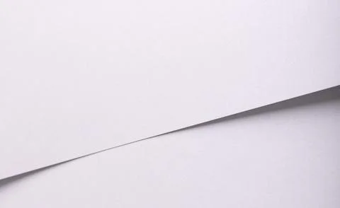 White matte paper background with a subtle grainy texture and clean surface. Stock Photos