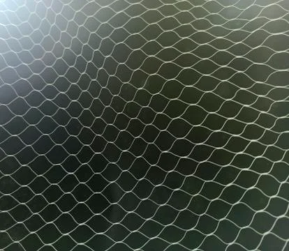 White mesh pattern on black background Stock Photos