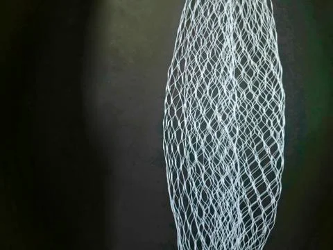 White mesh pattern on black background Stock Photos