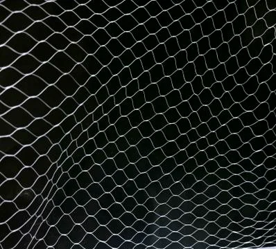 White mesh pattern on black background Stock Photos