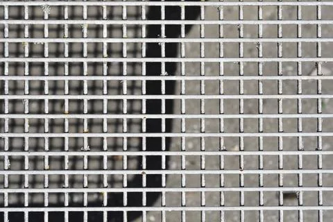 White metal grid mesh texture in a horizontal full frame background Stock Photos