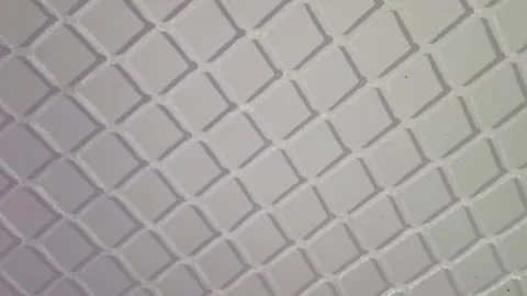 White metal grid pattern often used as fencing. Great for adding a modern touch  Stock Footage 335058168