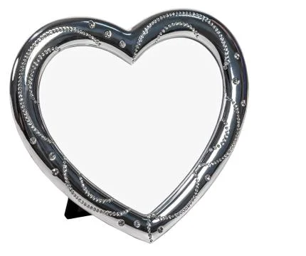 White metal photo frame with cristall in form of heart Stock Photos