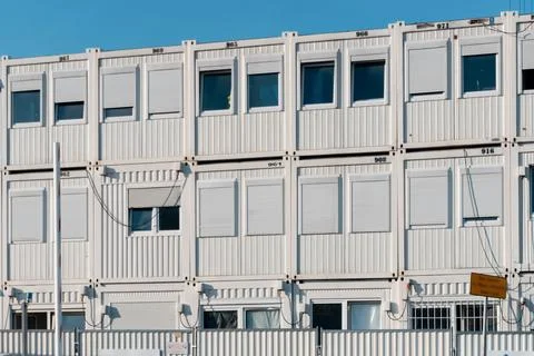 White metal temporary construction trailers and containers set for workers Stock Photos