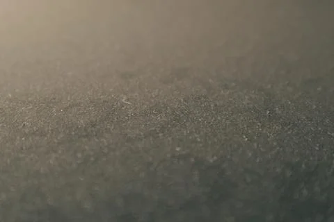 White micro dust on black background. Texture grunge background with tiny w.. Stock Photos