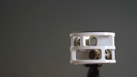 White microphone movement on dark background 4K Stock Footage 146723438