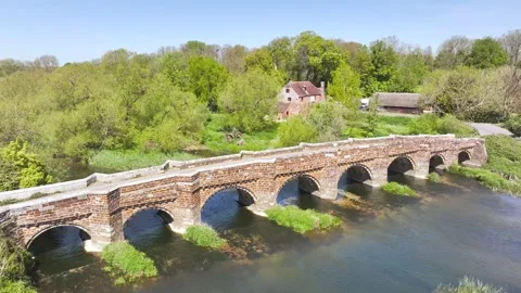 White Mill and Old Bridge over River Stour, Sturminster Marshall, Dorset, UK Video stock 344071435