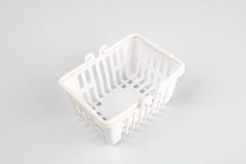 White, minimalistic 3D model of a red shopping cart over white background E.. Stock Photos