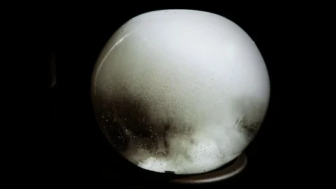 White Mist of Bubbles in a Glass Round a Bowl on a Black Background Stock Footage 76391005