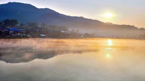White mist with Green mountain Stock Footage 128999200